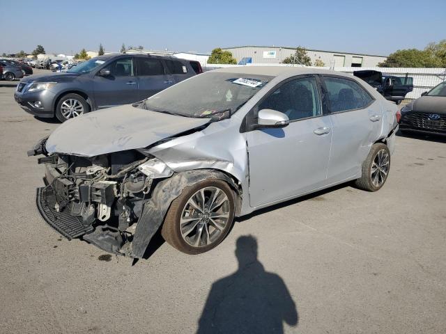 VIN 5YFBURHE6HP627921 2017 Toyota Corolla, L no.1