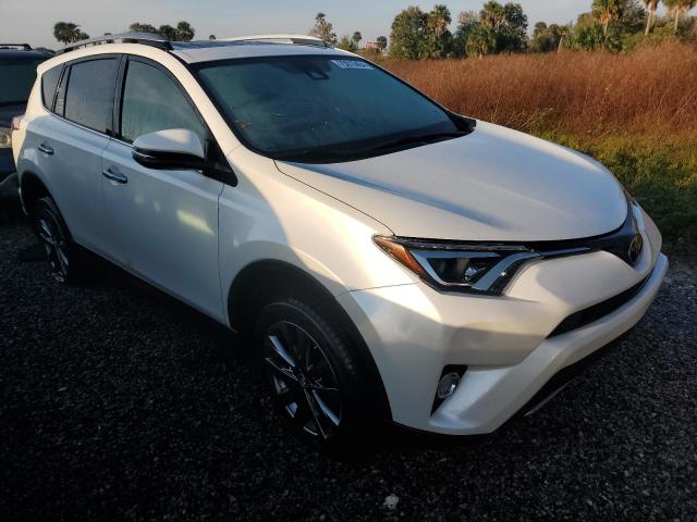 VIN JTMYFREVXJJ168203 2018 Toyota RAV4, Limited no.4