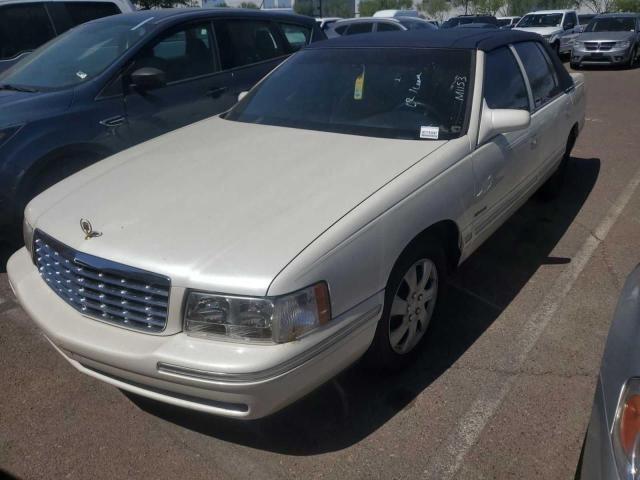 CADILLAC DEVILLE 1997 cream sedan 4d gas 1G6KD54Y8VU256755 photo #1