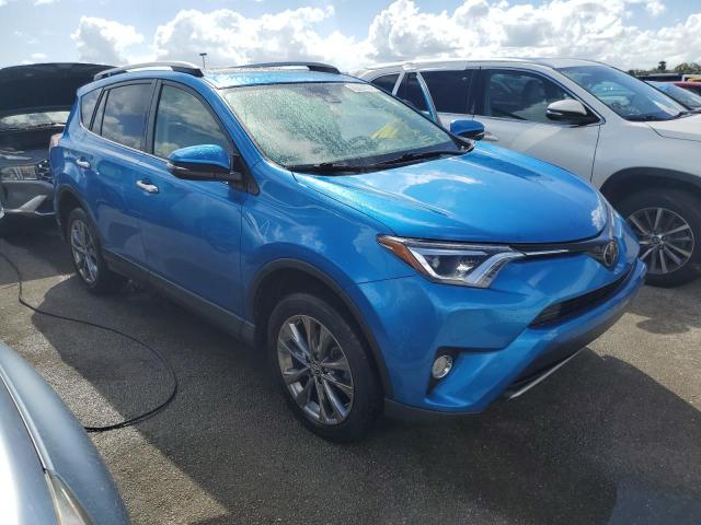 VIN JTMYFREV9JJ203183 2018 Toyota RAV4, Limited no.4