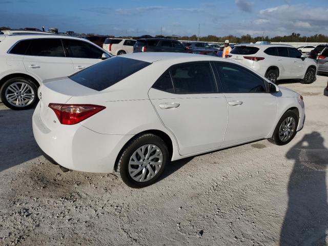 VIN 5YFBURHE1KP917961 2019 Toyota Corolla, L no.3