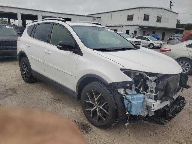 VIN JTMJFREV4GJ055048 2016 Toyota RAV4, SE no.4