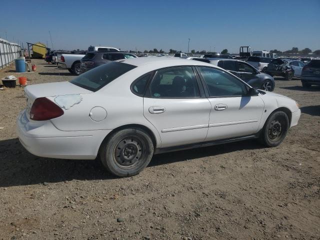 FORD TAURUS LX 2001 white sedan 4d flexible fuel 1FAFP52281A246183 photo #4