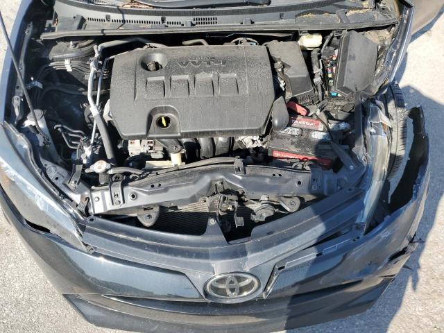 VIN 5YFBURHE2JP769219 2018 Toyota Corolla, L no.11