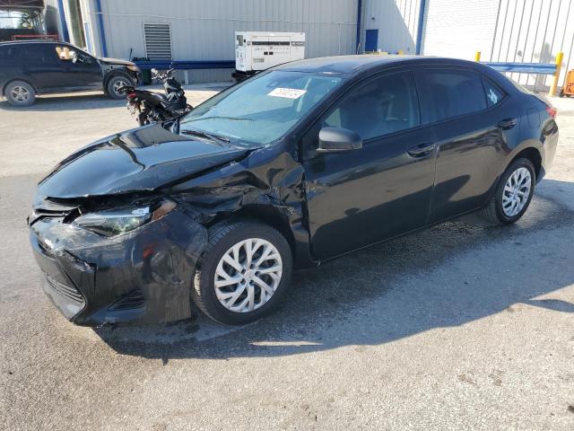 VIN 5YFBURHE2JP769219 2018 Toyota Corolla, L no.1