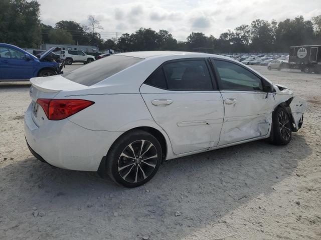 VIN 5YFBURHE8JP774716 2018 Toyota Corolla, L no.3