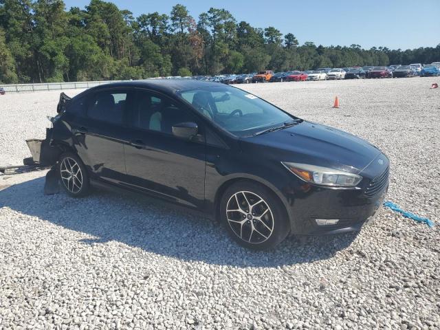 VIN 1FADP3F22JL256525 2018 Ford Focus, SE no.4