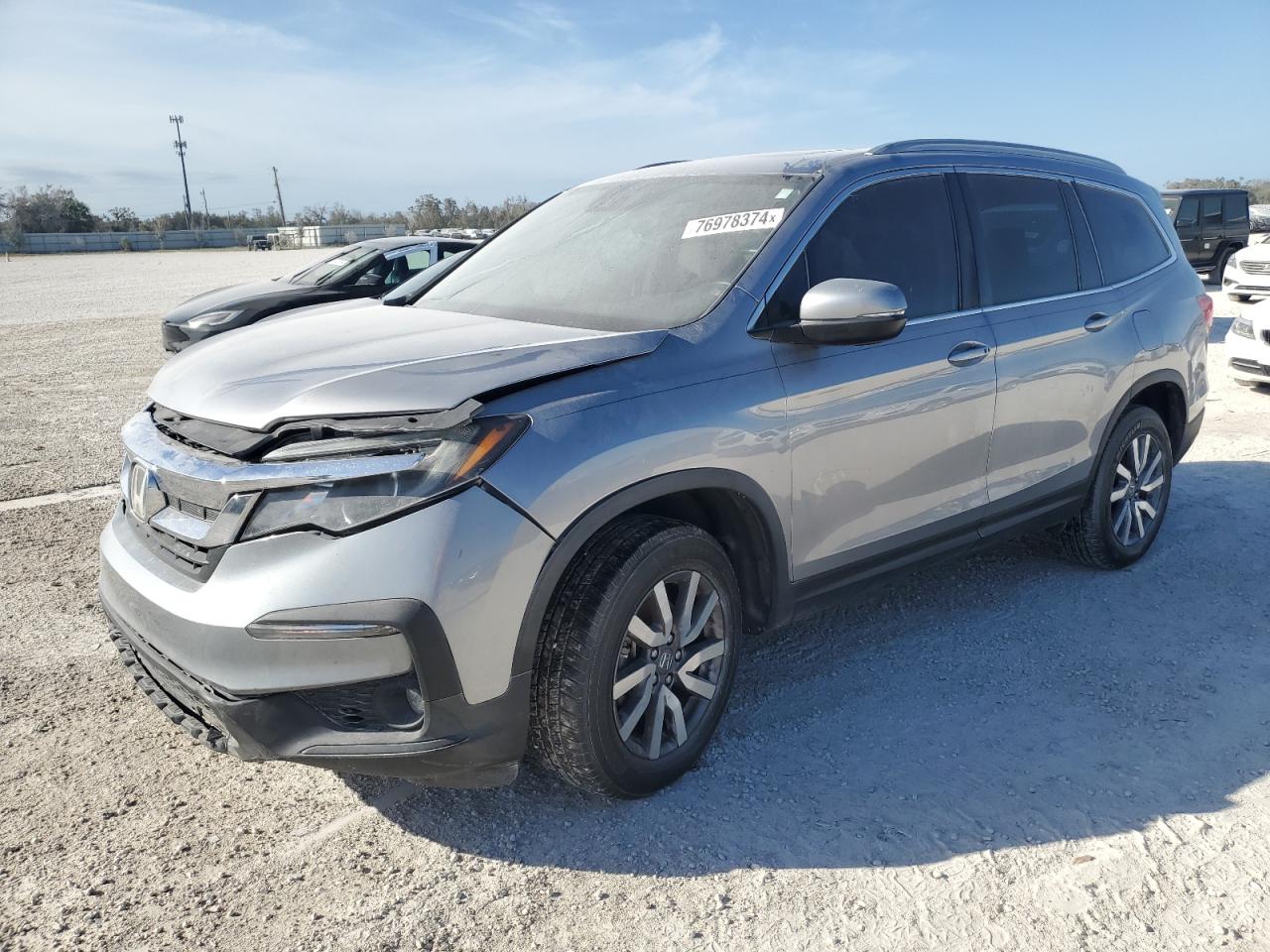 HONDA PILOT EXL 2019 silver  gas 5FNYF6H52KB089076 photo #1