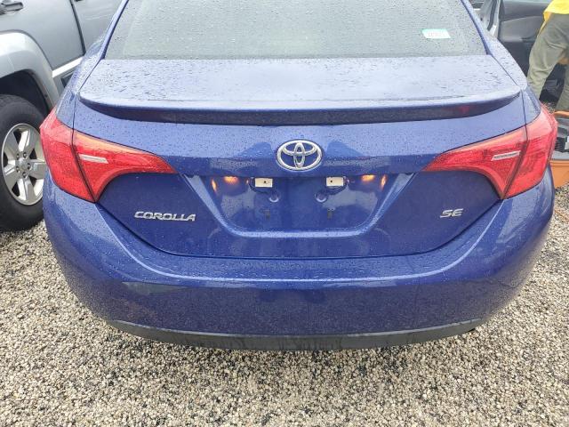 VIN 5YFBURHE6JP824688 2018 Toyota Corolla, L no.6