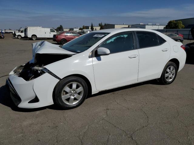 VIN 5YFBURHE7HP723377 2017 Toyota Corolla, L no.1