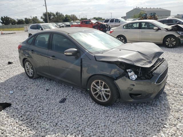 VIN 1FADP3F25FL300752 2015 Ford Focus, SE no.4