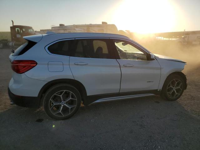 VIN WBXHU7C34J5H43034 2018 BMW X1 no.3