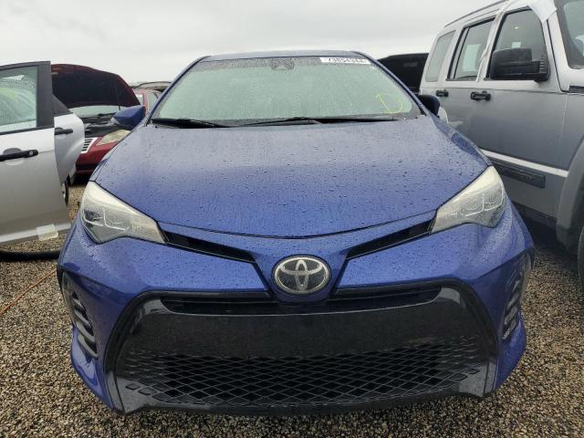 VIN 5YFBURHE6JP824688 2018 Toyota Corolla, L no.5