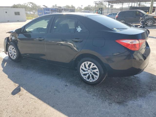 VIN 5YFBURHE2JP769219 2018 Toyota Corolla, L no.2