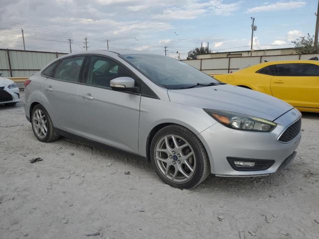 VIN 1FADP3F29FL320079 2015 FORD FOCUS no.4