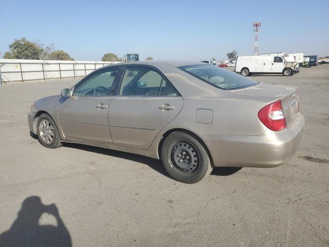 TOYOTA CAMRY LE 2003 gold sedan 4d gas JTDBE32K430155066 photo #3