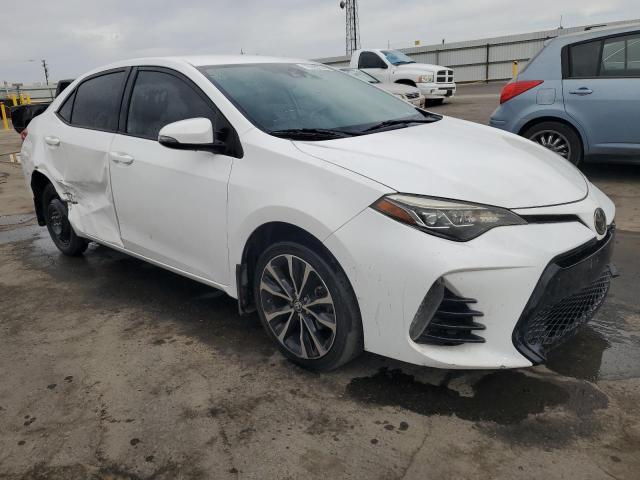 VIN 5YFBURHE5HP692775 2017 Toyota Corolla, L no.4