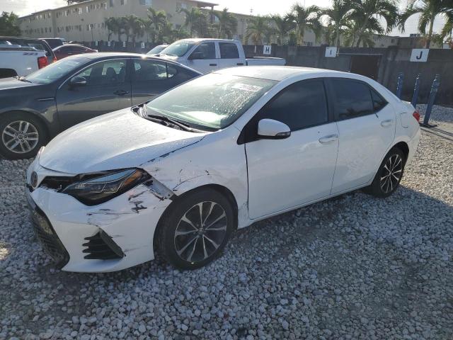 VIN 5YFBURHE6HP580079 2017 Toyota Corolla, L no.1