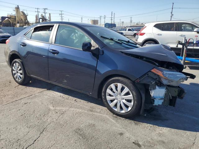 VIN 5YFBURHE9JP795977 2018 Toyota Corolla, L no.4