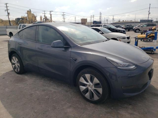 VIN 7SAYGDEE3PA136323 2023 Tesla MODEL Y no.4