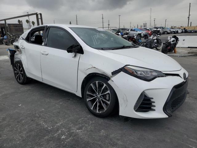 VIN 5YFBURHE1KP878997 2019 TOYOTA COROLLA no.4