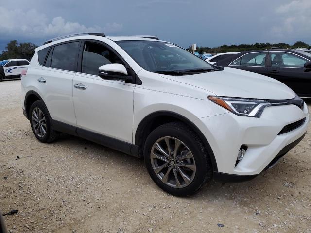 VIN JTMYFREVXJJ733727 2018 Toyota RAV4, Limited no.4