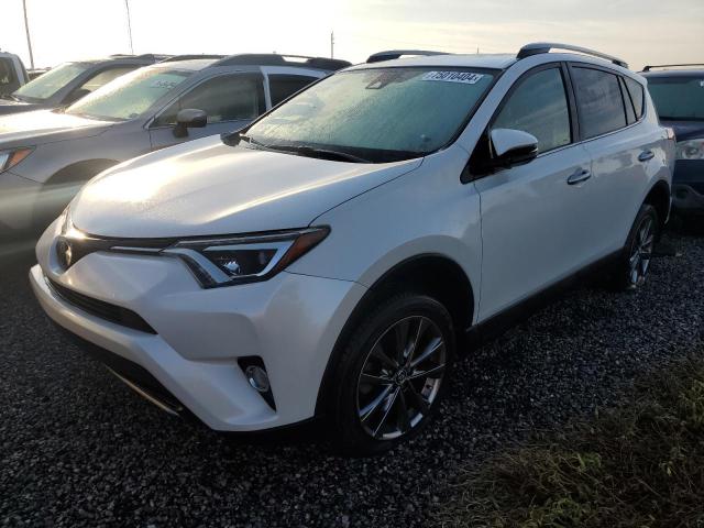 VIN JTMYFREVXJJ168203 2018 Toyota RAV4, Limited no.1