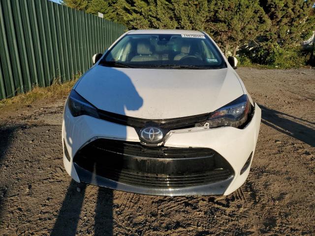 VIN 5YFBURHE7JP806202 2018 Toyota Corolla, L no.5