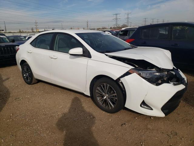 VIN 5YFBURHE9JP773574 2018 Toyota Corolla, L no.4