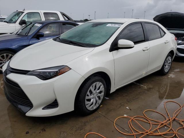 VIN 5YFBURHE4KP880100 2019 Toyota Corolla, L no.1