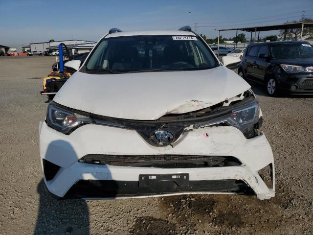 2018 TOYOTA RAV4 HV LE - JTMRJREV3JD189587