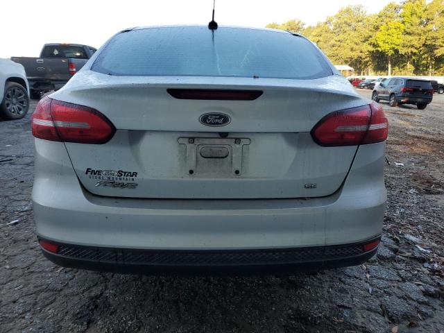 VIN 1FADP3F2XJL214247 2018 Ford Focus, SE no.6