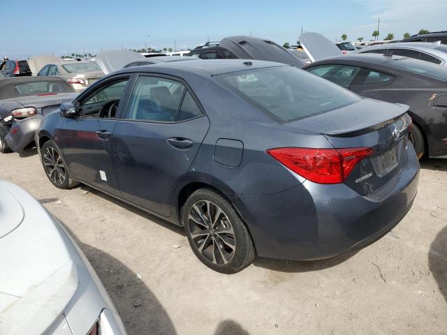 VIN 5YFBURHE4JP827265 2018 Toyota Corolla, L no.2