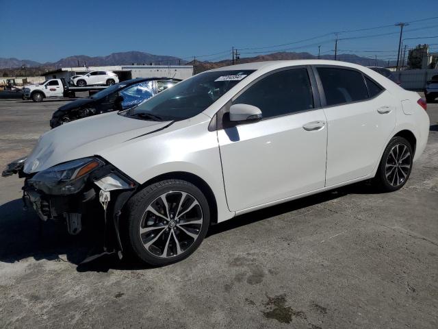 VIN 5YFBURHE0HP720708 2017 Toyota Corolla, L no.1