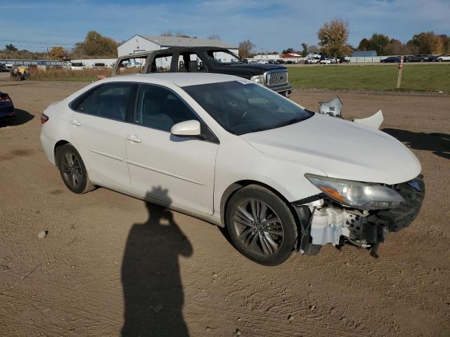 VIN 4T1BF1FK0FU483945 2015 Toyota Camry, LE no.4