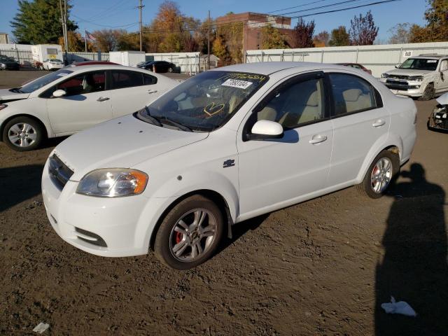 CHEVROLET AVEO LS 2011 white sedan 4d gas KL1TD5DE4BB231079 photo #1