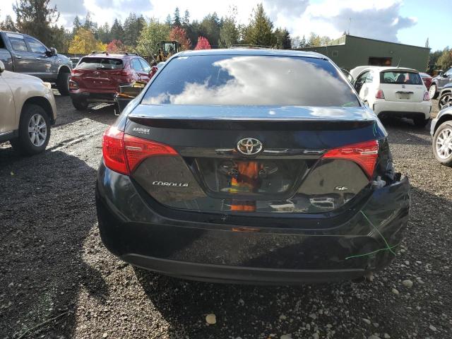 VIN 5YFBURHE5JP823449 2018 Toyota Corolla, L no.6