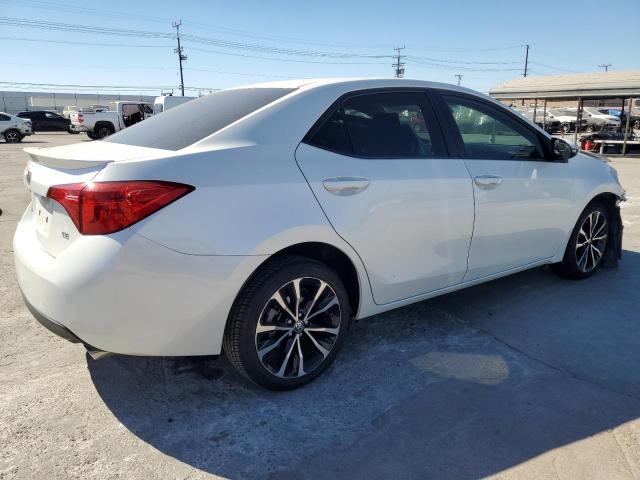 VIN 5YFBURHE0HP720708 2017 Toyota Corolla, L no.3