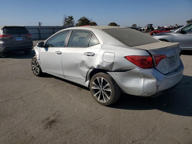 VIN 5YFBURHE6HP627921 2017 Toyota Corolla, L no.2