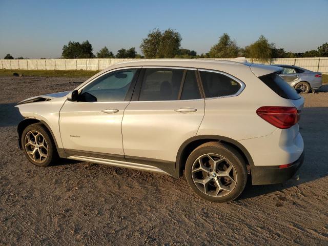 VIN WBXHU7C34J5H43034 2018 BMW X1 no.2