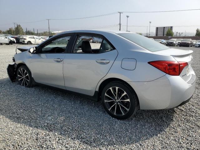 VIN 5YFBURHE5HP615291 2017 Toyota Corolla, L no.2