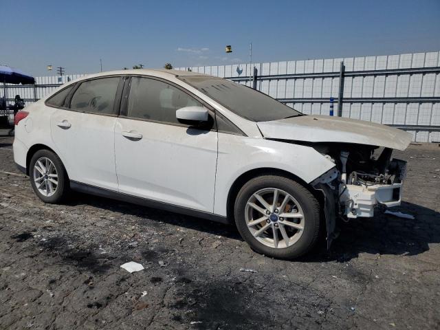 VIN 1FADP3F22JL224626 2018 Ford Focus, SE no.4