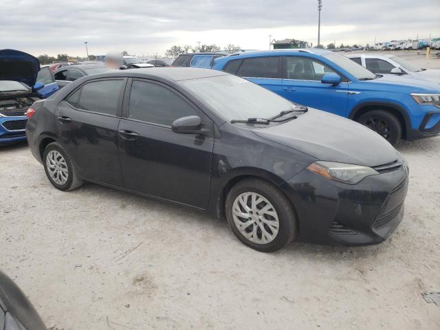 VIN 5YFBURHE5HP735057 2017 Toyota Corolla, L no.4