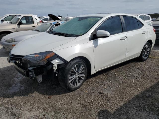 VIN 5YFBURHE0JP829000 2018 TOYOTA COROLLA no.1