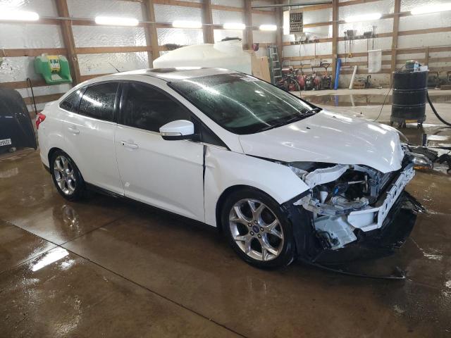 VIN 1FADP3J22EL223148 2014 Ford Focus, Titanium no.4