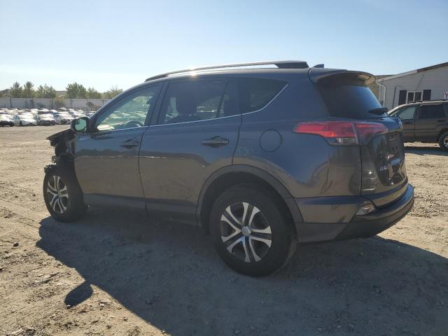 VIN JTMZFREV7HJ128532 2017 Toyota RAV4, LE no.2