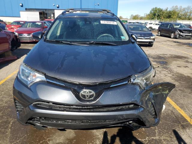 VIN JTMBFREV4JJ720347 2018 Toyota RAV4, LE no.5