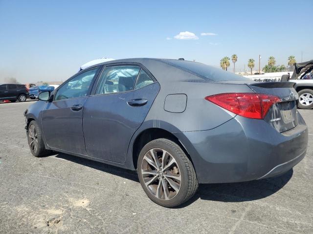 VIN 5YFBURHE7HP658661 2017 Toyota Corolla, L no.2