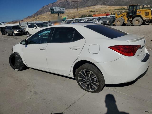 VIN 5YFBURHEXJP760641 2018 Toyota Corolla, L no.2