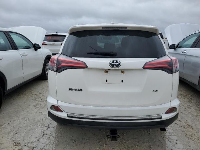 VIN JTMZFREV5JJ734952 2018 Toyota RAV4, LE no.6